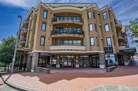 Photo of 10047 Main Street #206, Bellevue, WA 98004 (MLS # 2442019)