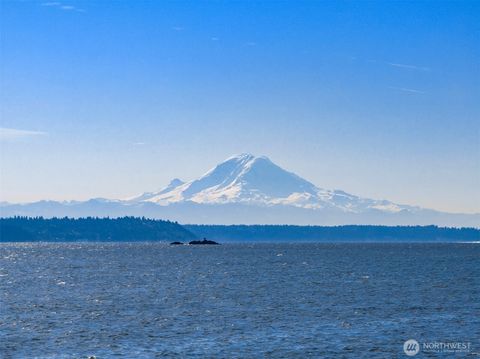 Photo of 5430 Rockaway Beach Road NE, Bainbridge Island, WA 98110 (MLS # 2499784)