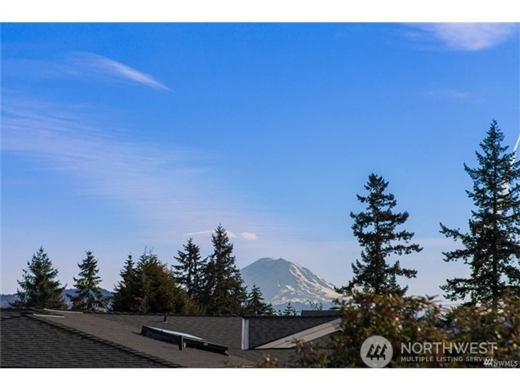 Photo of 9631 Hilltop Road, Bellevue, WA 98004 (MLS # 2186569)