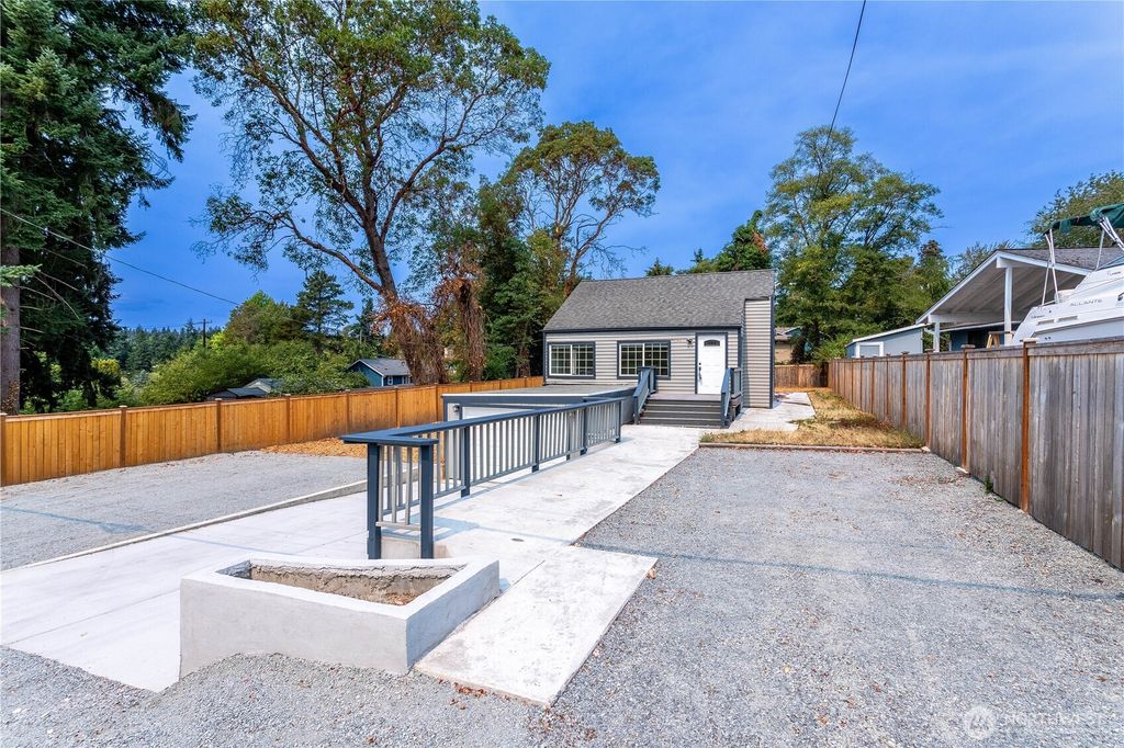 Photo of 2644 SW 112th Street, Seattle, WA 98146 (MLS # 2423611)