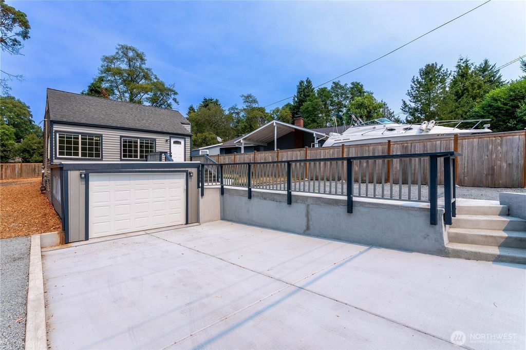 Photo of 2644 SW 112th Street, Seattle, WA 98146 (MLS # 2423611)