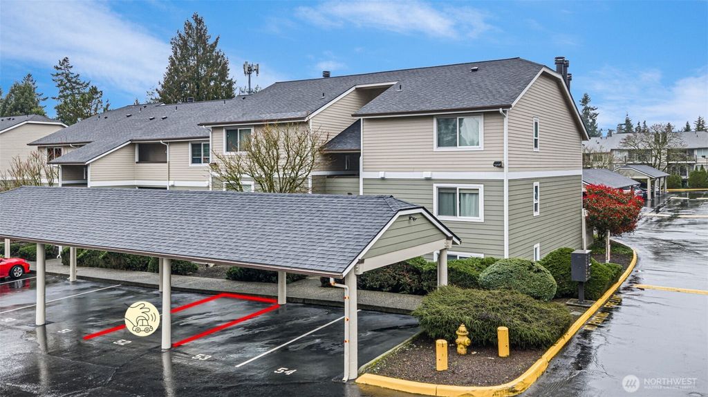 Photo of 12514 NE 142nd Lane #D-104, Kirkland, WA 98034 (MLS # 2493270)