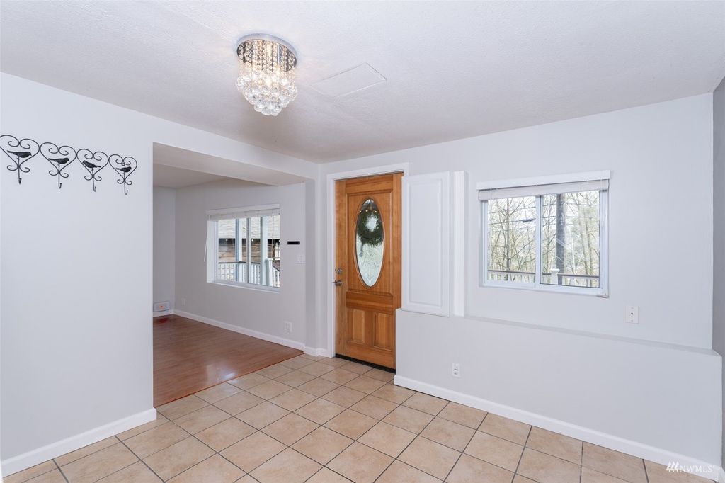 Photo of 13757 Macadam Road S, Tukwila, WA 98168 (MLS # 1979641)