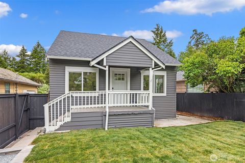 Photo of 5040 35th Avenue SW, Seattle, WA 98126 (MLS # 2546665)