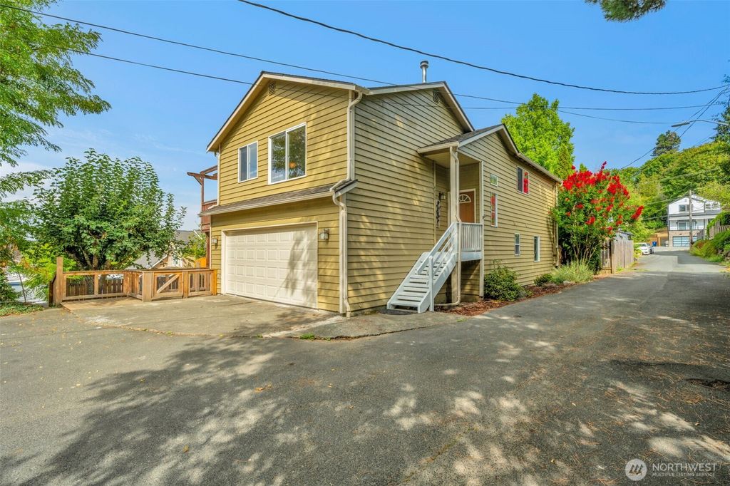 Photo of 4835 S Graham Street, Seattle, WA 98118 (MLS # 2446591)