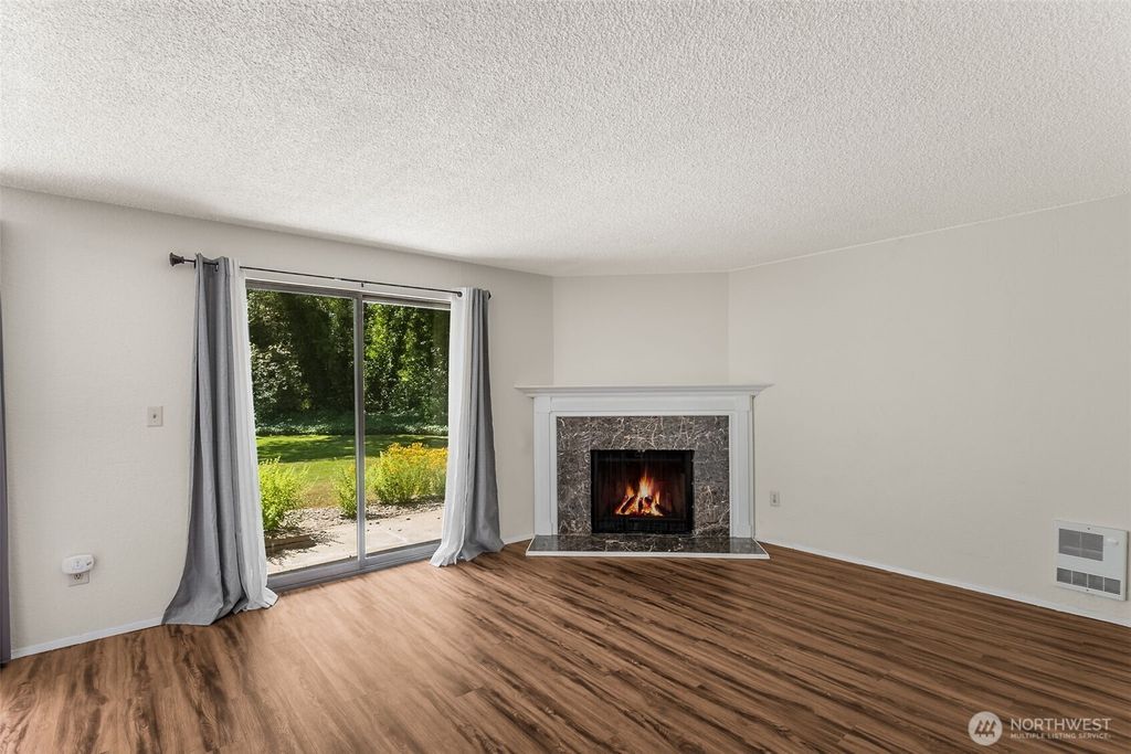 Photo of 4920 200th Street SW #A105, Lynnwood, WA 98036 (MLS # 2409098)