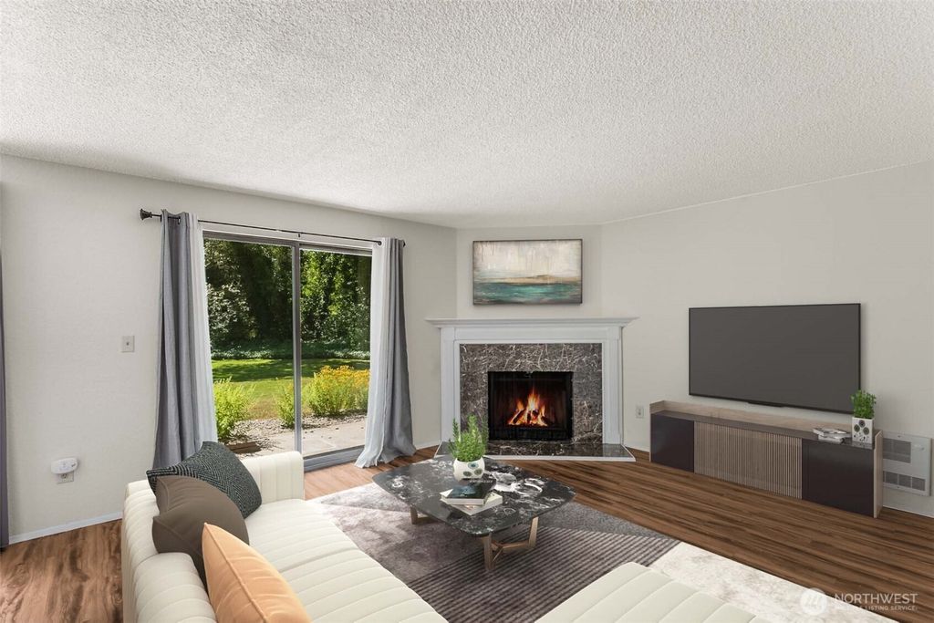 Photo of 4920 200th Street SW #A105, Lynnwood, WA 98036 (MLS # 2409098)