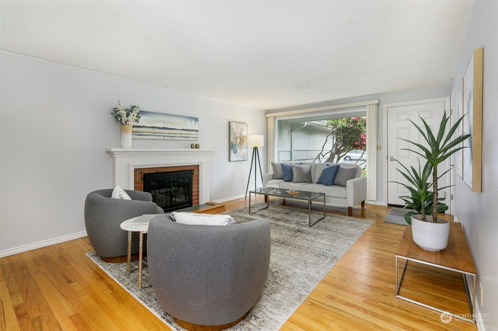 Photo of 12029 10th Avenue NW, Seattle, WA 98177 (MLS # 2231159)