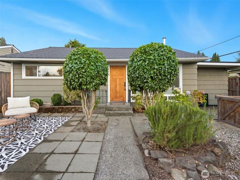 Photo of 9303 32nd Avenue SW, Seattle, WA 98126 (MLS # 2439335)