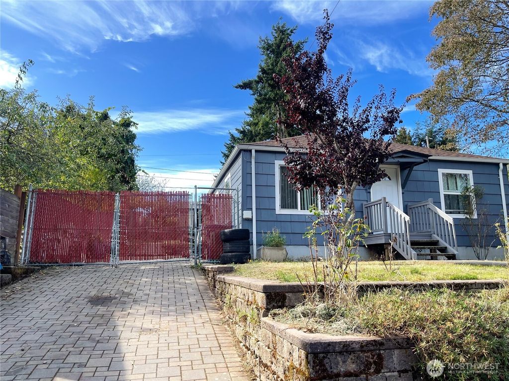 Photo of 9827 20th Avenue SW, Seattle, WA 98106 (MLS # 2440544)