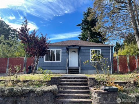 Photo of 9827 20th Avenue SW, Seattle, WA 98106 (MLS # 2440544)