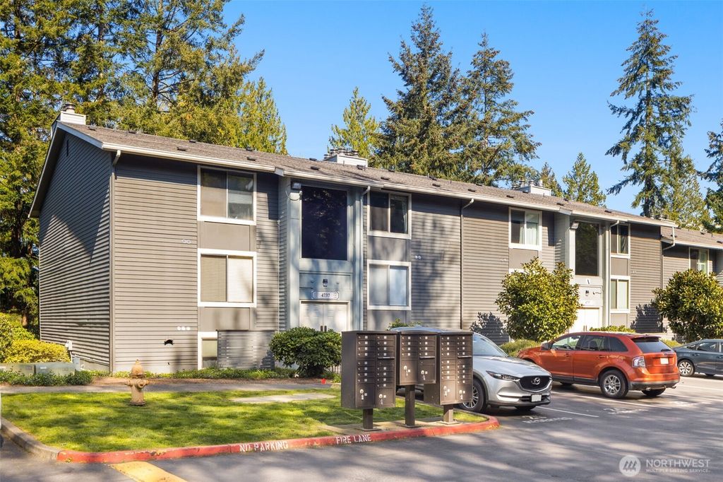 Photo of 4737 W Lake Sammamish Parkway SE #A102, Issaquah, WA 98027 (MLS # 2359833)