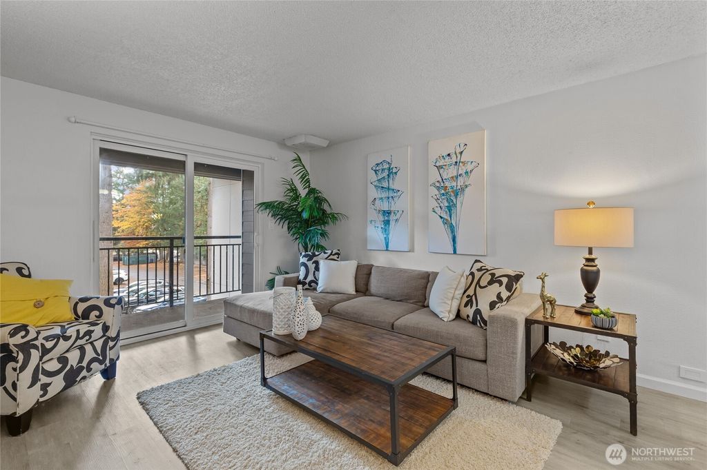 Photo of 14620 NE 31st Street #E-305, Bellevue, WA 98007 (MLS # 2450775)