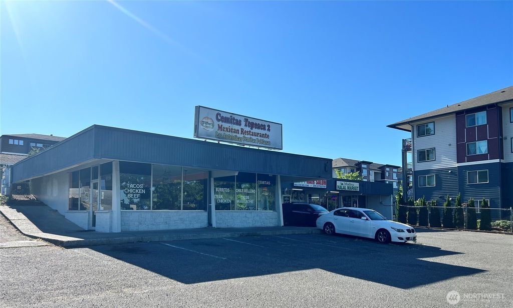 Photo of 21624 Pacific Highway Hwy S, Des Moines, WA 98198 (MLS # 2476900)