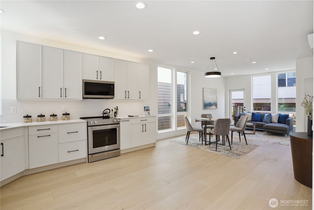 Photo of 9013 14th Avenue SW, Seattle, WA 98106 (MLS # 2492673)