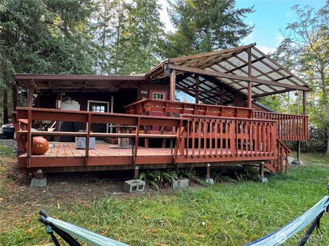 Photo of 819 E Madrona Boulevard NW, Lakebay, WA 98349 (MLS # 2443171)
