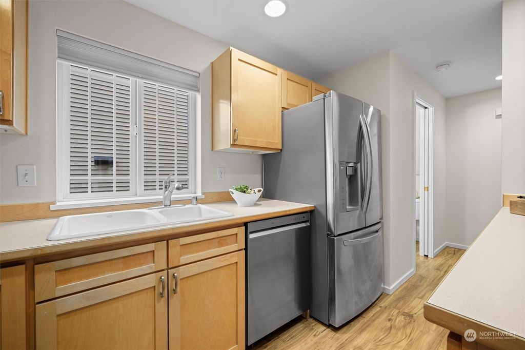 Photo of 6759 24th Ave Ave NW #D, Seattle, WA 98117 (MLS # 2322677)