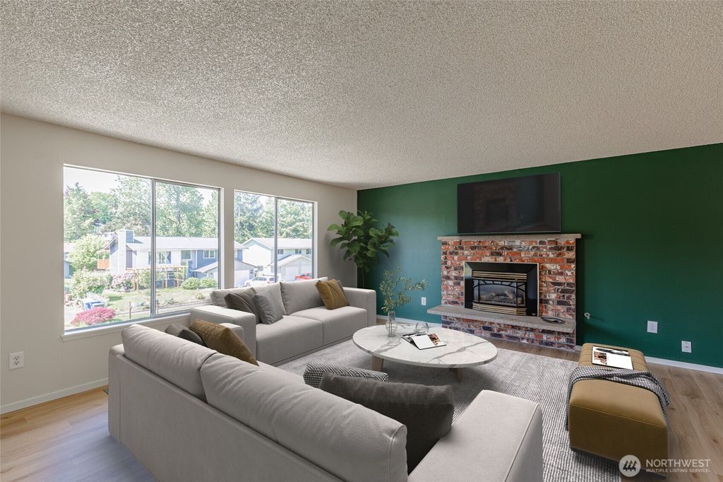 Photo of 1500 Harrington Avenue SE, Renton, WA 98058 (MLS # 2338495)