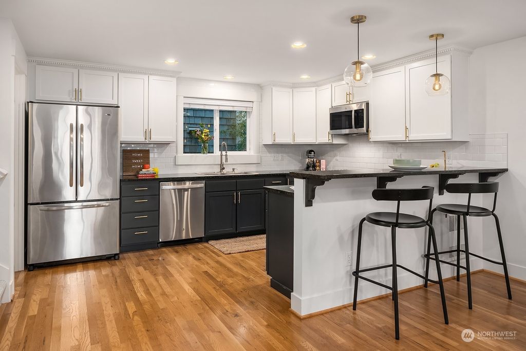 Photo of 9217 B Roosevelt Way NE, Seattle, WA 98115 (MLS # 2078277)