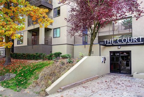 Photo of 7323 Sand Point Way NE #103, Seattle, WA 98115 (MLS # 2456878)