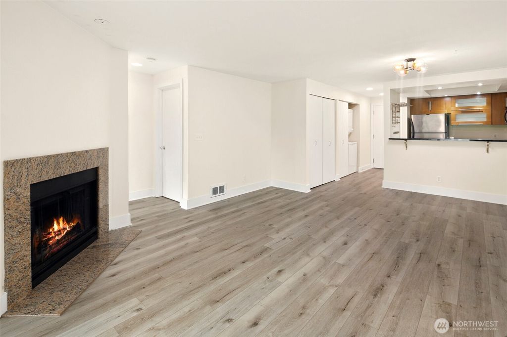 Photo of 7323 Sand Point Way NE #103, Seattle, WA 98115 (MLS # 2456878)