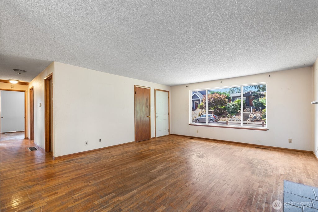 Photo of 8400 32nd Avenue SW, Seattle, WA 98126 (MLS # 2579386)