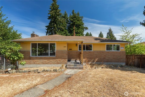 Photo of 8400 32nd Avenue SW, Seattle, WA 98126 (MLS # 2579386)