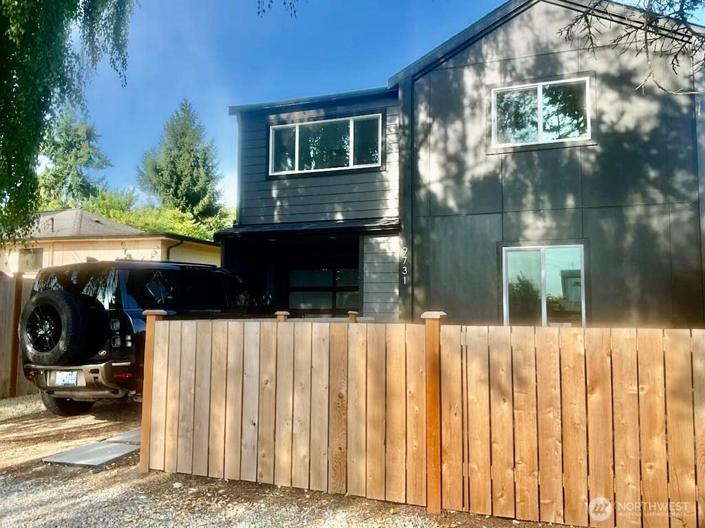 Photo of 9731 13th Avenue NW, Seattle, WA 98117 (MLS # 2508645)