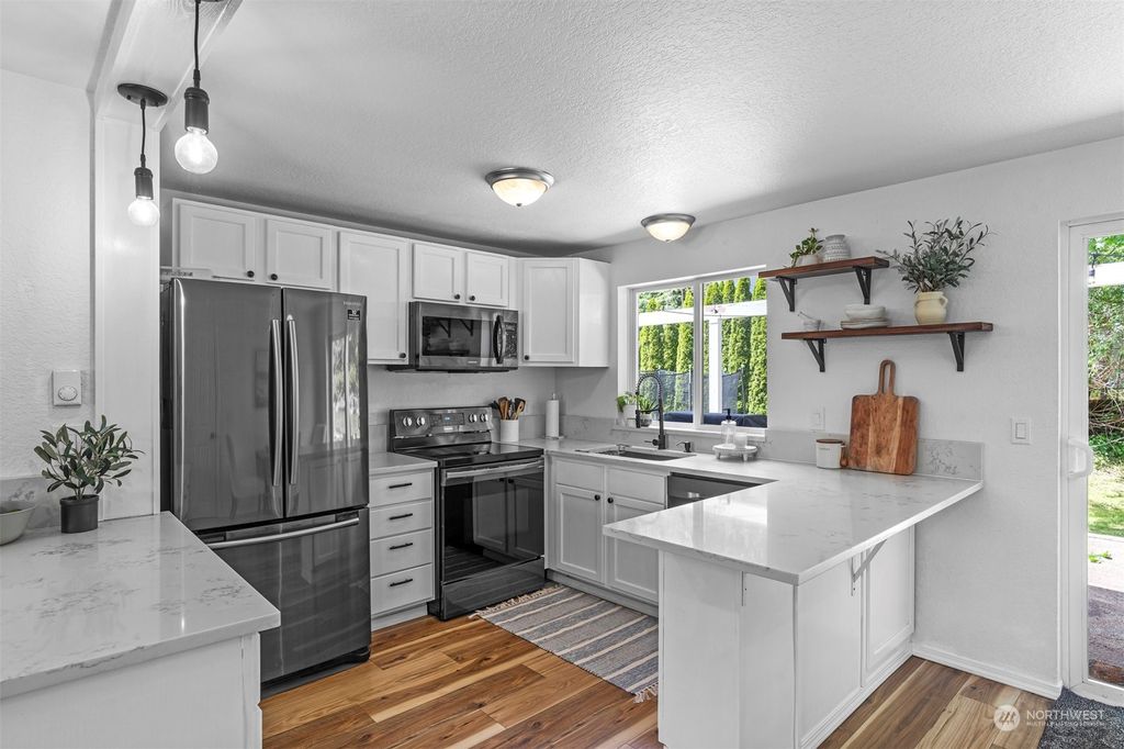 Photo of 828 103rd Drive SE, Lake Stevens, WA 98258 (MLS # 2246432)