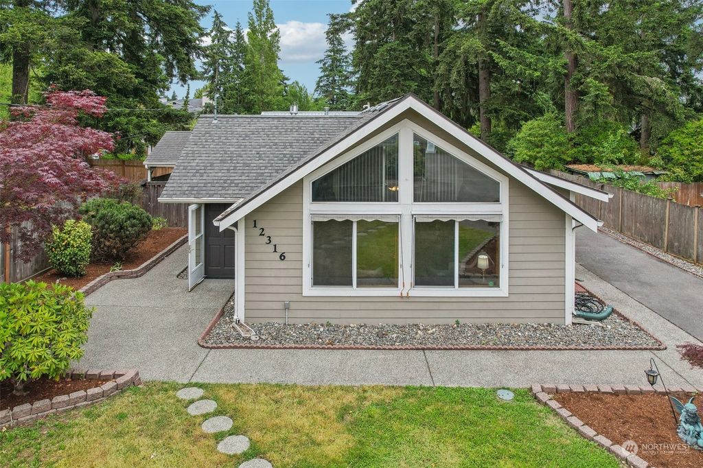 Photo of 12316 8th Avenue NE, Seattle, WA 98125 (MLS # 2249475)