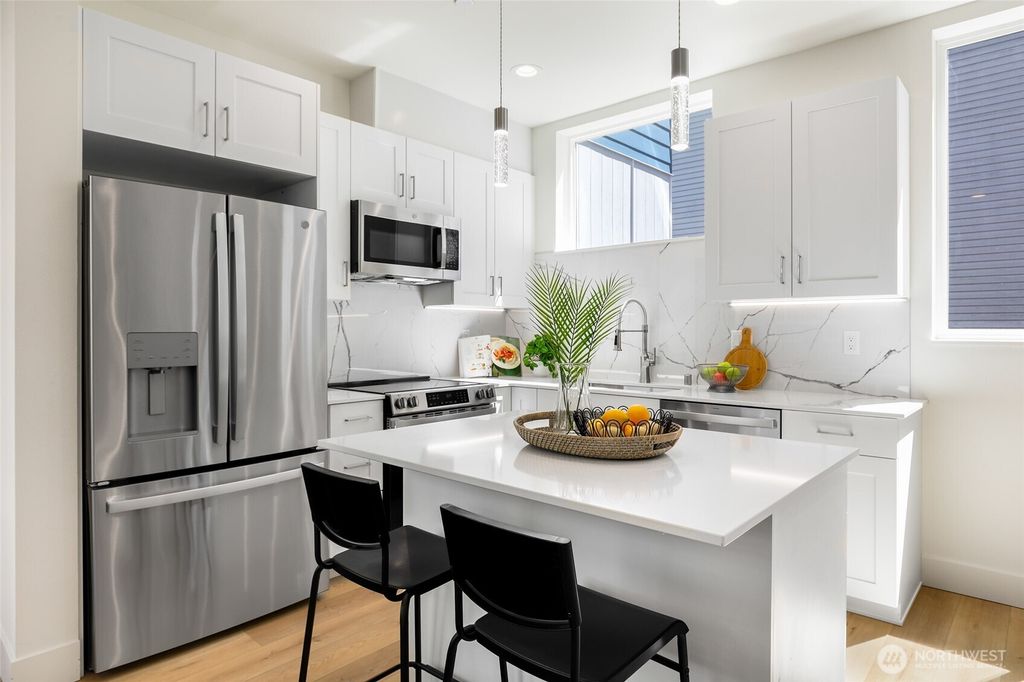 Photo of 10533 B Stone Avenue N, Seattle, WA 98133 (MLS # 2469727)