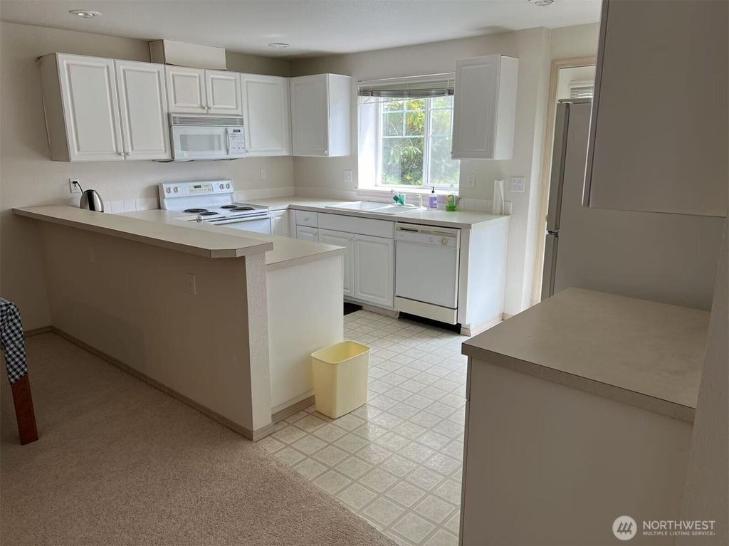 Photo of 1160 Monroe Avenue NE #C1, Renton, WA 98056 (MLS # 2414371)