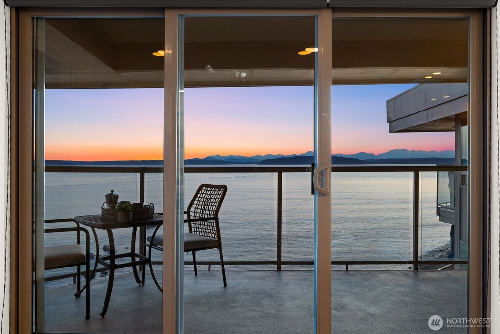 Photo of 3633 Beach Drive SW #402, Seattle, WA 98116 (MLS # 2411748)