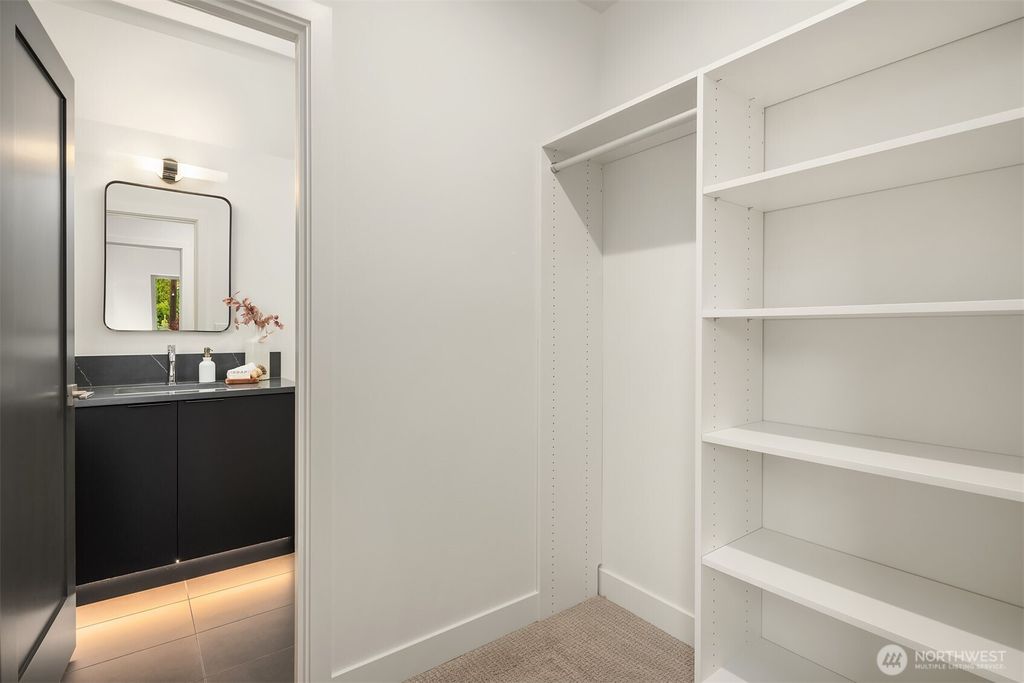 Photo of 9047 Dibble Avenue NW, Seattle, WA 98117 (MLS # 2395558)