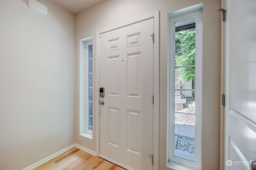 Photo of 10384 157th Place NE #104, Redmond, WA 98052 (MLS # 2139223)