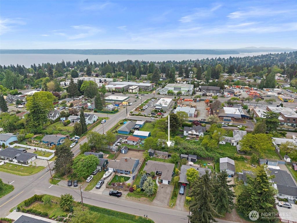 Photo of 11303 14th Avenue SW, Seattle, WA 98146 (MLS # 2517644)