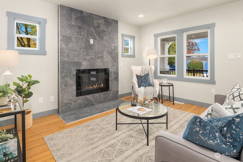 Photo of 4911 S Genesee Street, Seattle, WA 98118 (MLS # 2175628)