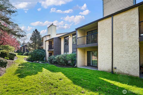 Photo of 14510 124th Avenue NE #E35, Kirkland, WA 98034 (MLS # 2510078)