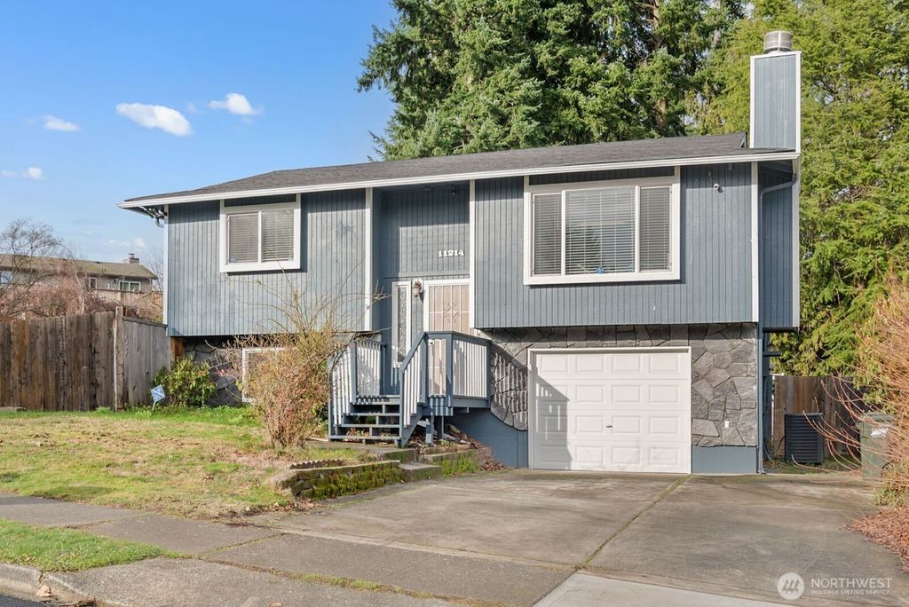 Photo of 11214 SE 232nd Street, Kent, WA 98031 (MLS # 2467152)