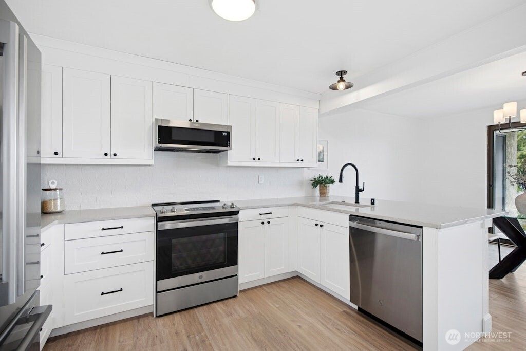 Photo of 1706 NE 179th St #C102, Shoreline, WA 98155 (MLS # 2353752)