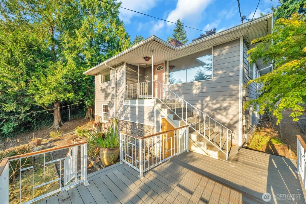 Photo of 8814 14th Avenue SW, Seattle, WA 98106 (MLS # 2579603)