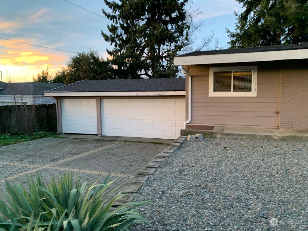 Photo of 11725 25th Avenue S, Seattle, WA 98168 (MLS # 2189399)