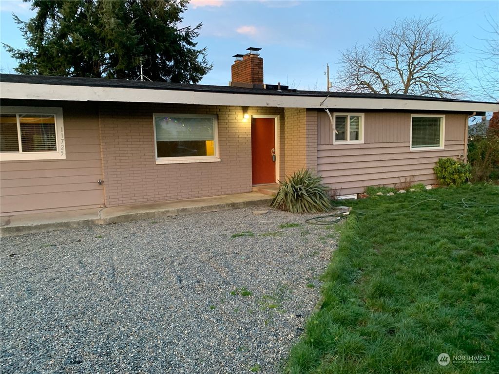 Photo of 11725 25th Avenue S, Seattle, WA 98168 (MLS # 2189399)