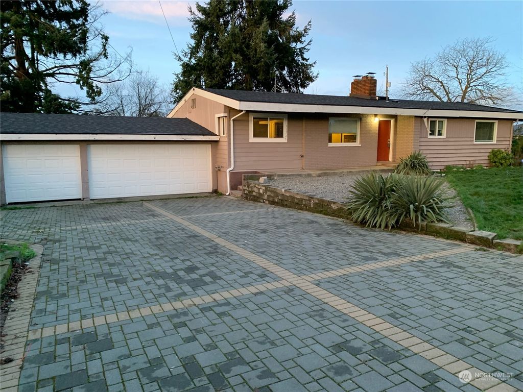Photo of 11725 25th Avenue S, Seattle, WA 98168 (MLS # 2189399)