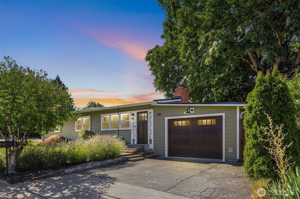 Photo of 2411 NE 7th St St, Renton, WA 98056 (MLS # 2418557)