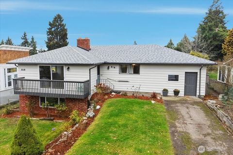 Photo of 818 SW 120th Street, Seattle, WA 98146 (MLS # 2458428)
