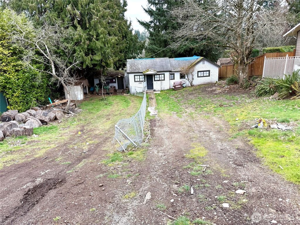 Photo of 11040 11th Ave SW Ave, Seattle, WA 98146 (MLS # 2475361)