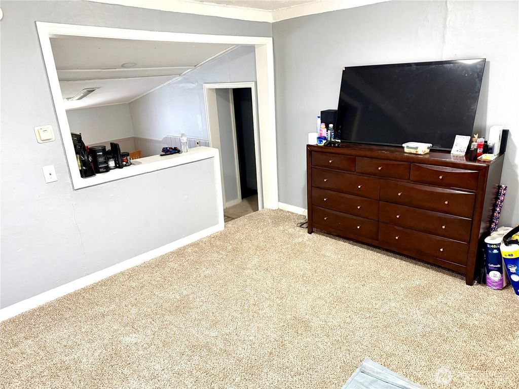 Photo of 11040 11th Ave SW Ave, Seattle, WA 98146 (MLS # 2475361)