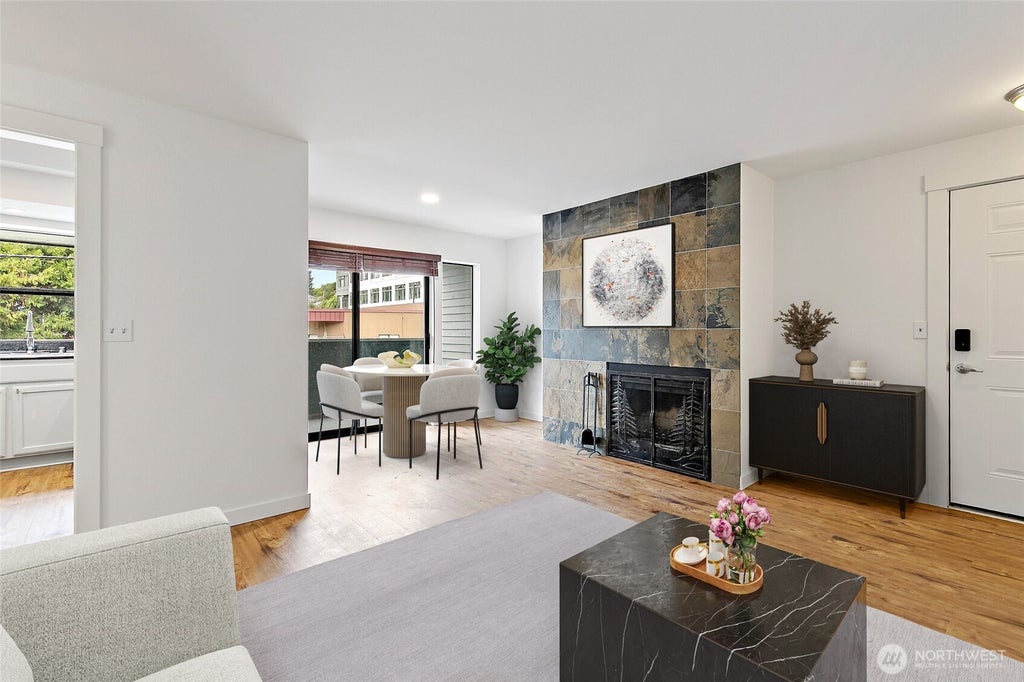 Photo of 8816 Nesbit Avenue N #101, Seattle, WA 98103 (MLS # 2575141)
