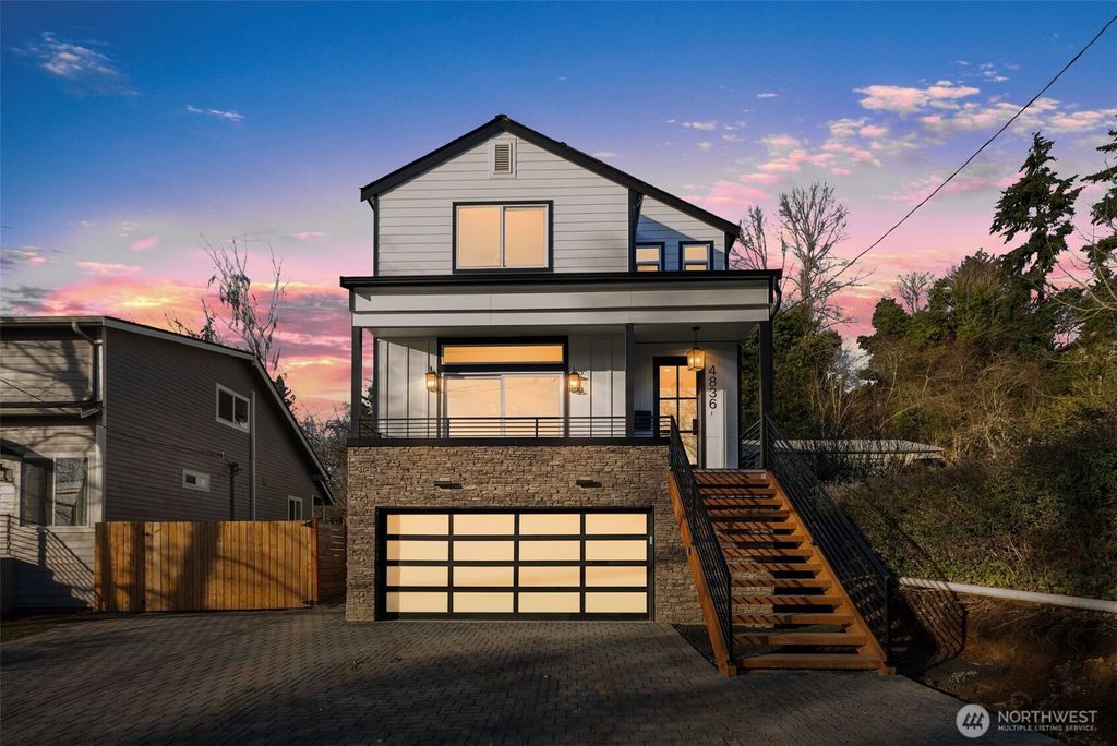 Photo of 4836 S Graham Street, Seattle, WA 98118 (MLS # 2324176)